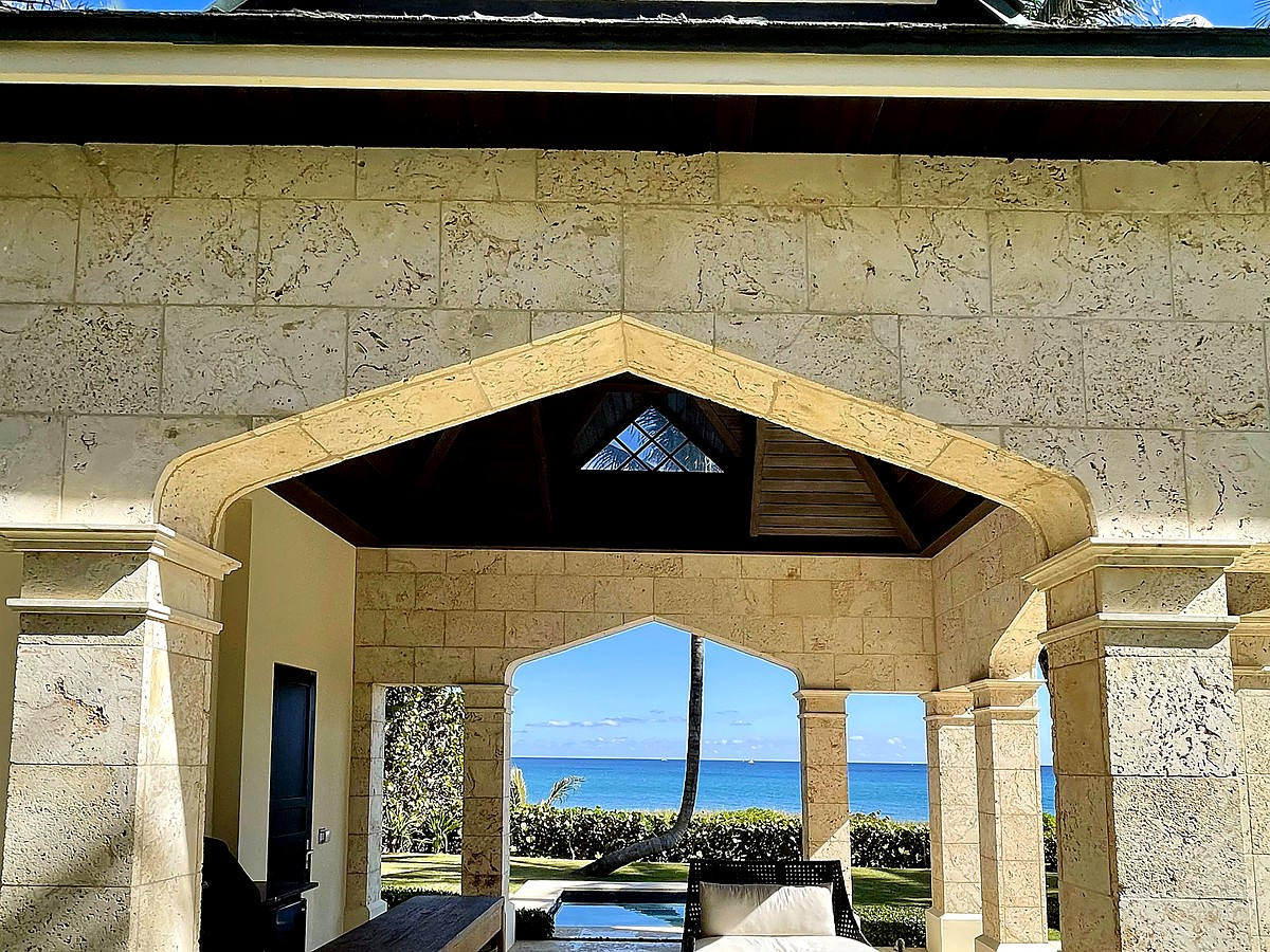 Beachfront estate stone archway with ocean view in Gulf Stream FL