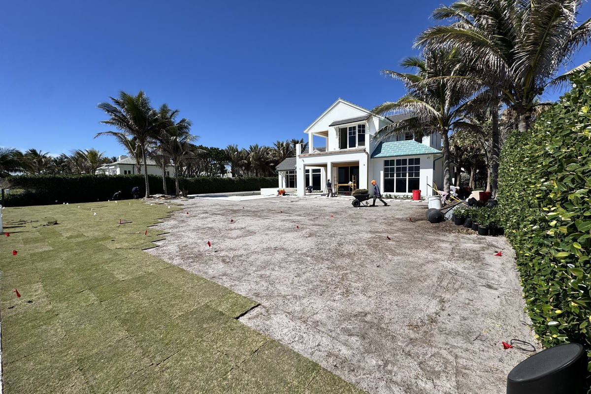 Beachfront home sod installation in progress