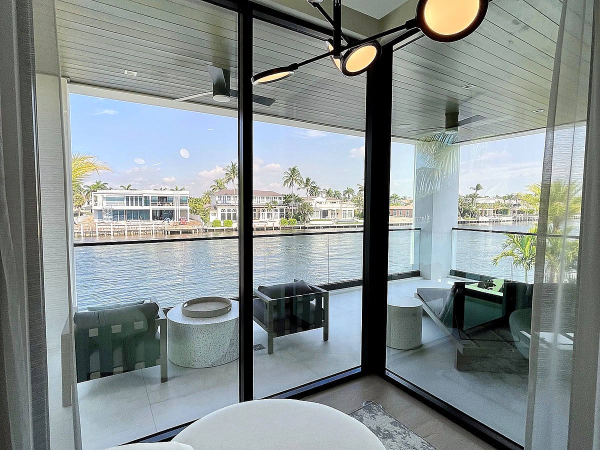 Luxury home with crystal clear glass walls and pool near Pompano Beach FL