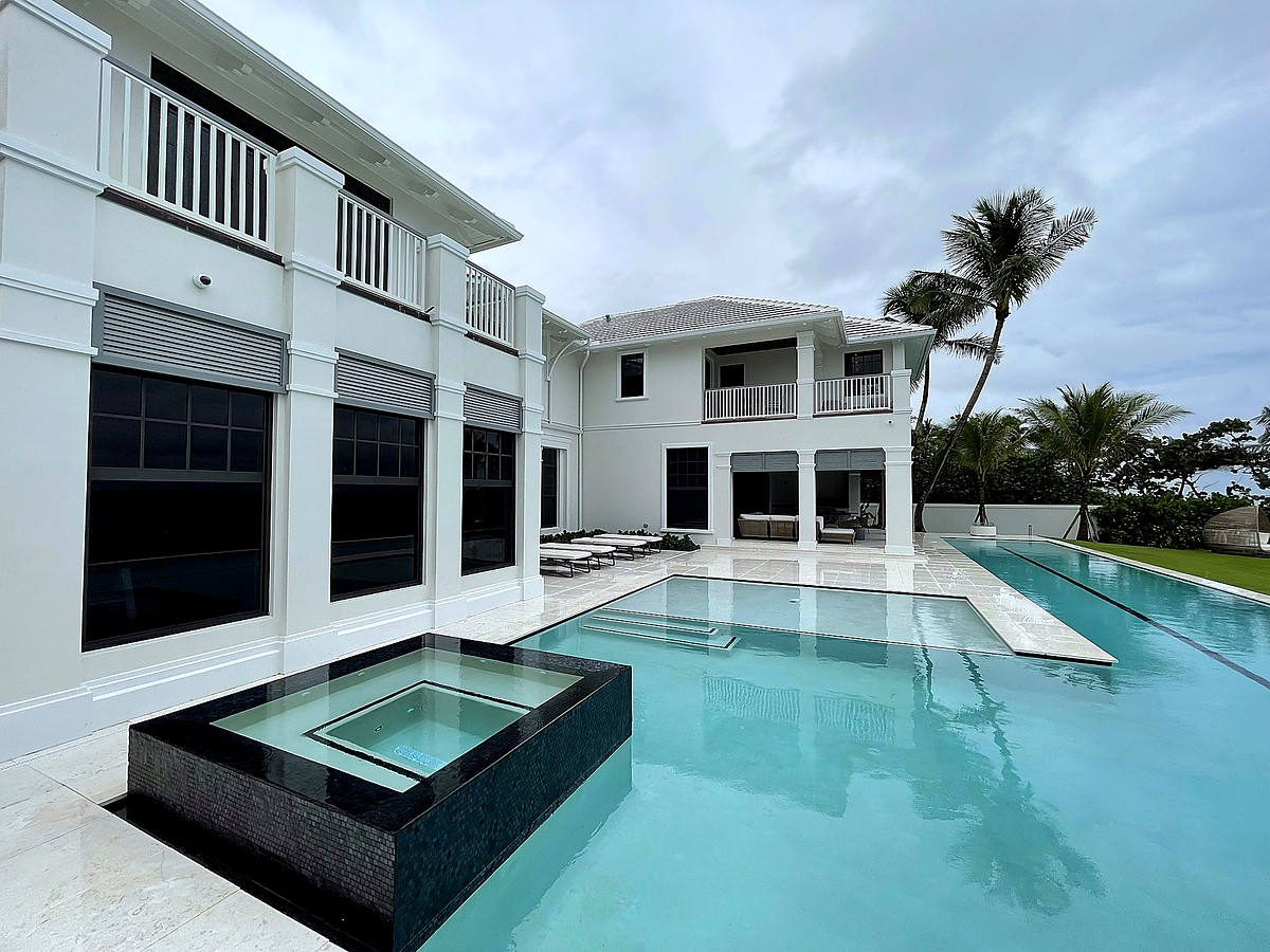 Gulf Stream oceanfront estate with infinity pool and crystal clear glass panels