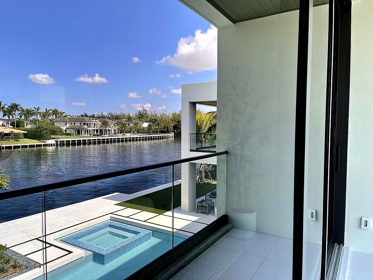 Modern Intracoastal home with pristine glass balcony in Lighthouse Point FL