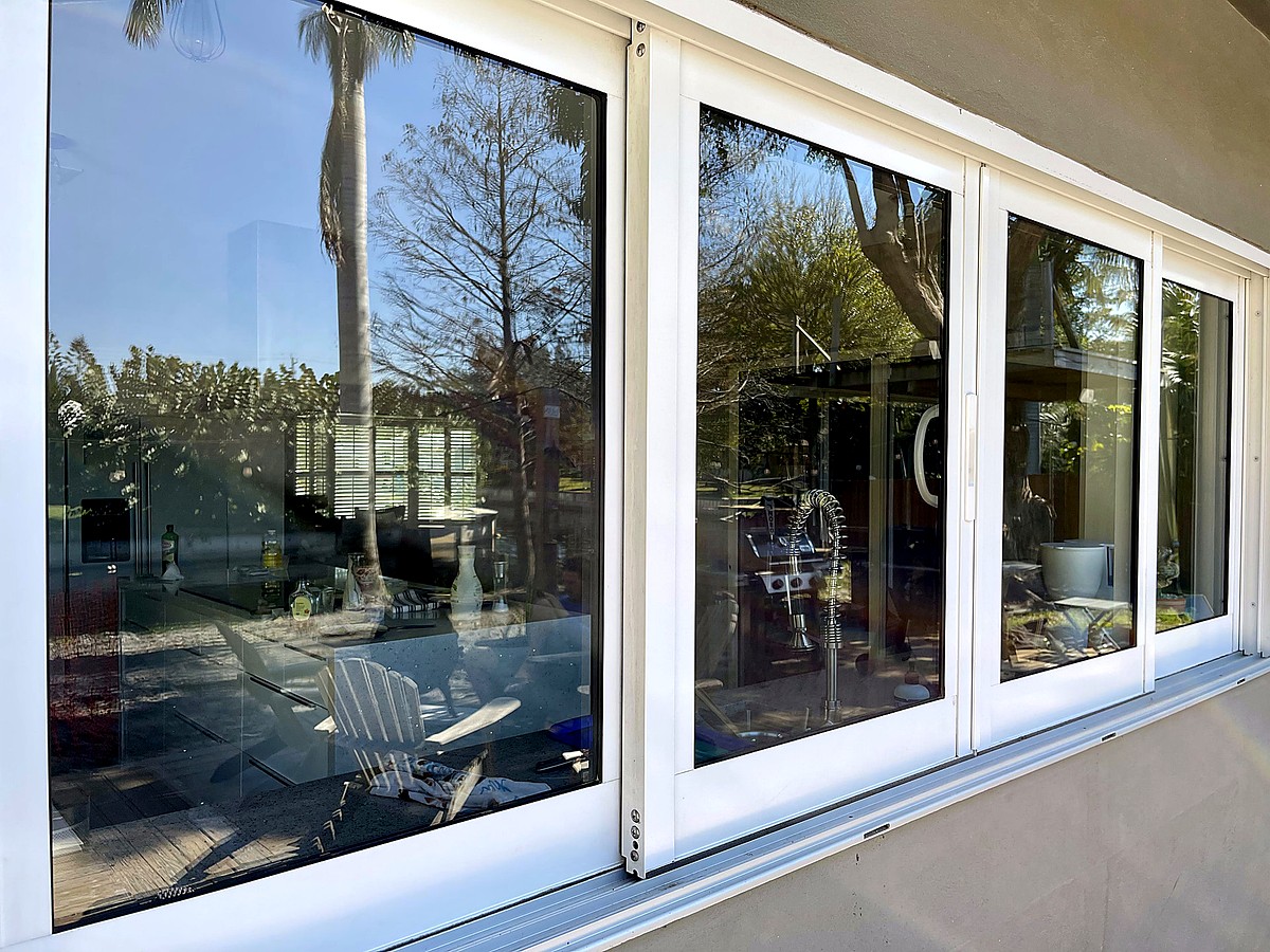 Luxury Boca Raton home with streak-free exterior windows after professional cleaning