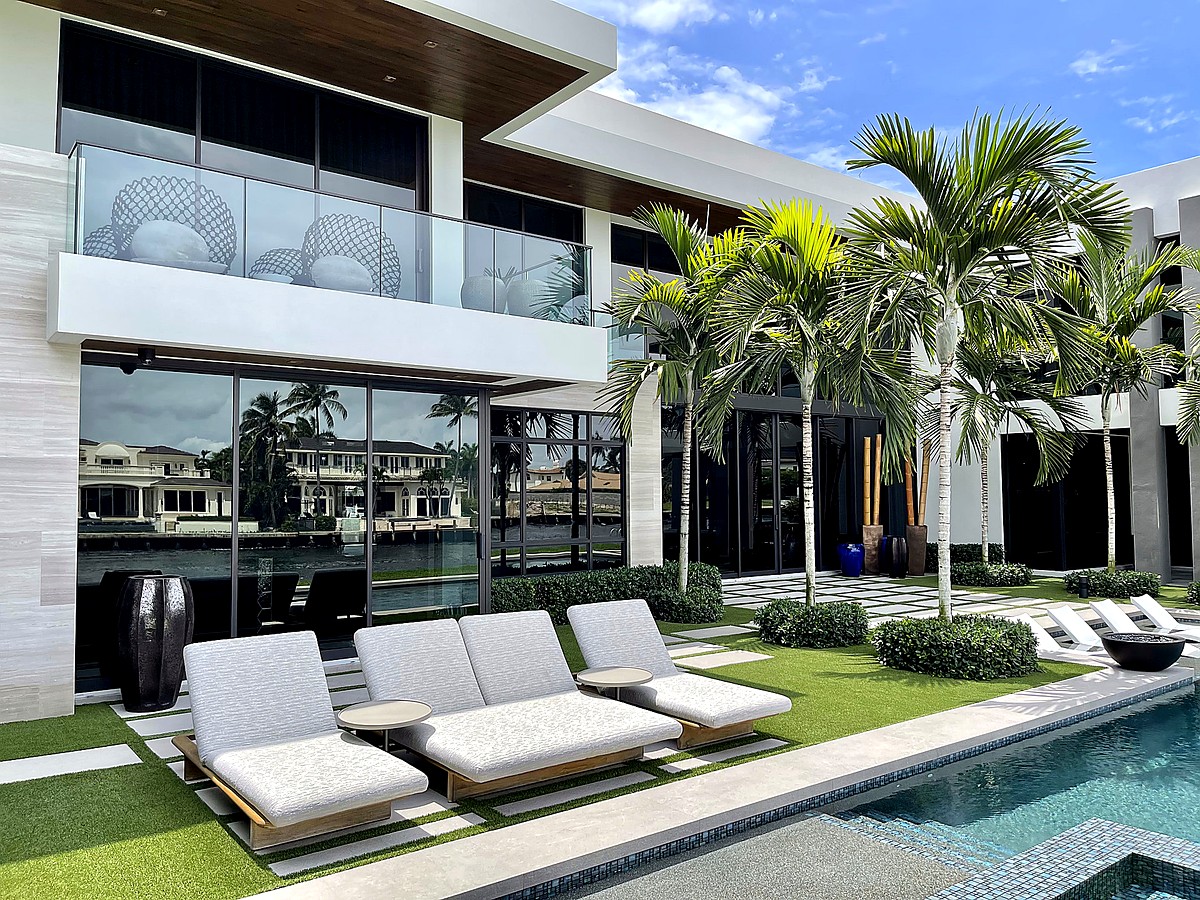 Pompano Beach oceanfront home with pristine glass doors and patio views