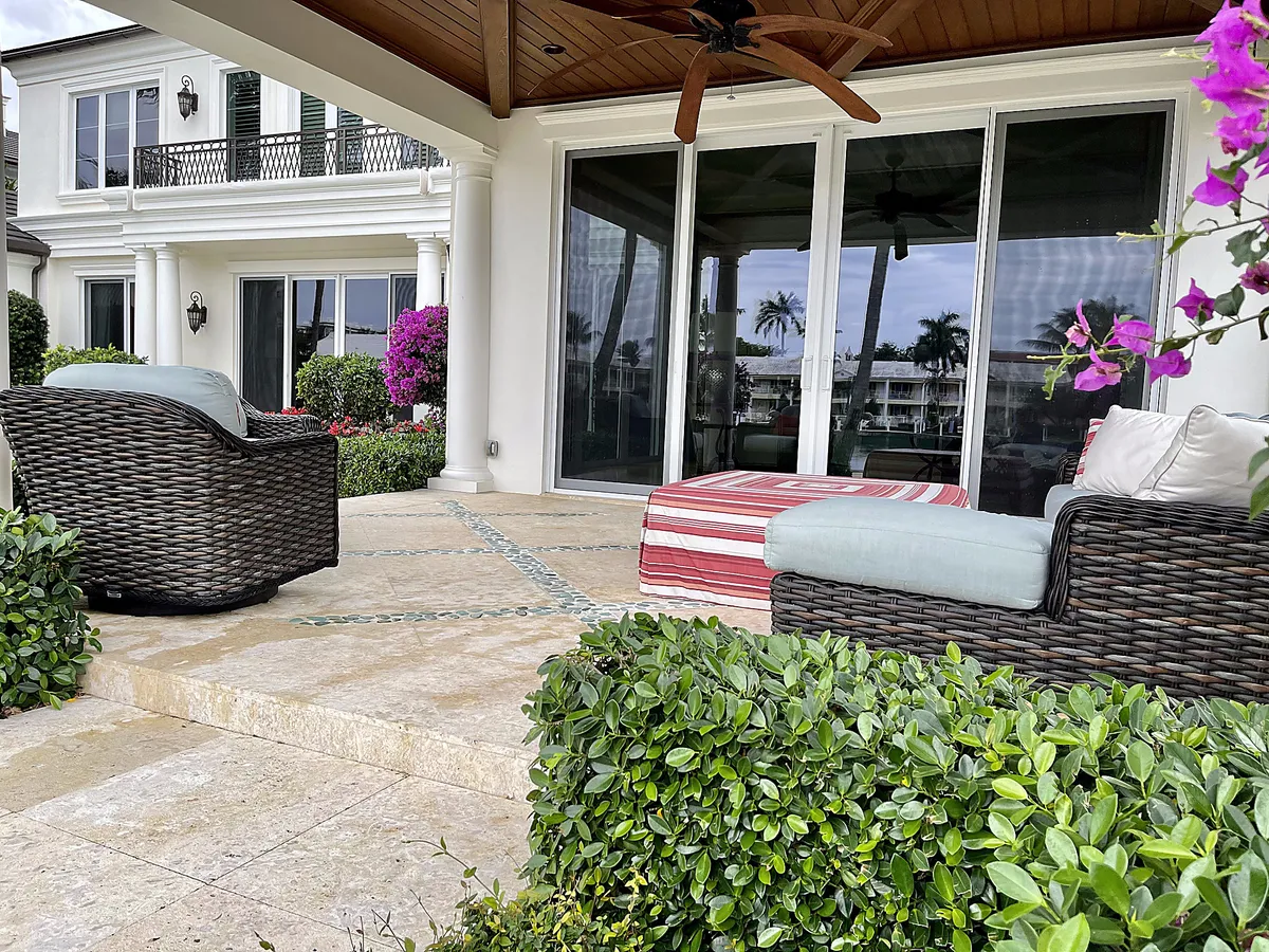 Patio with clean sliding glass and bougainvillea in Boca Raton