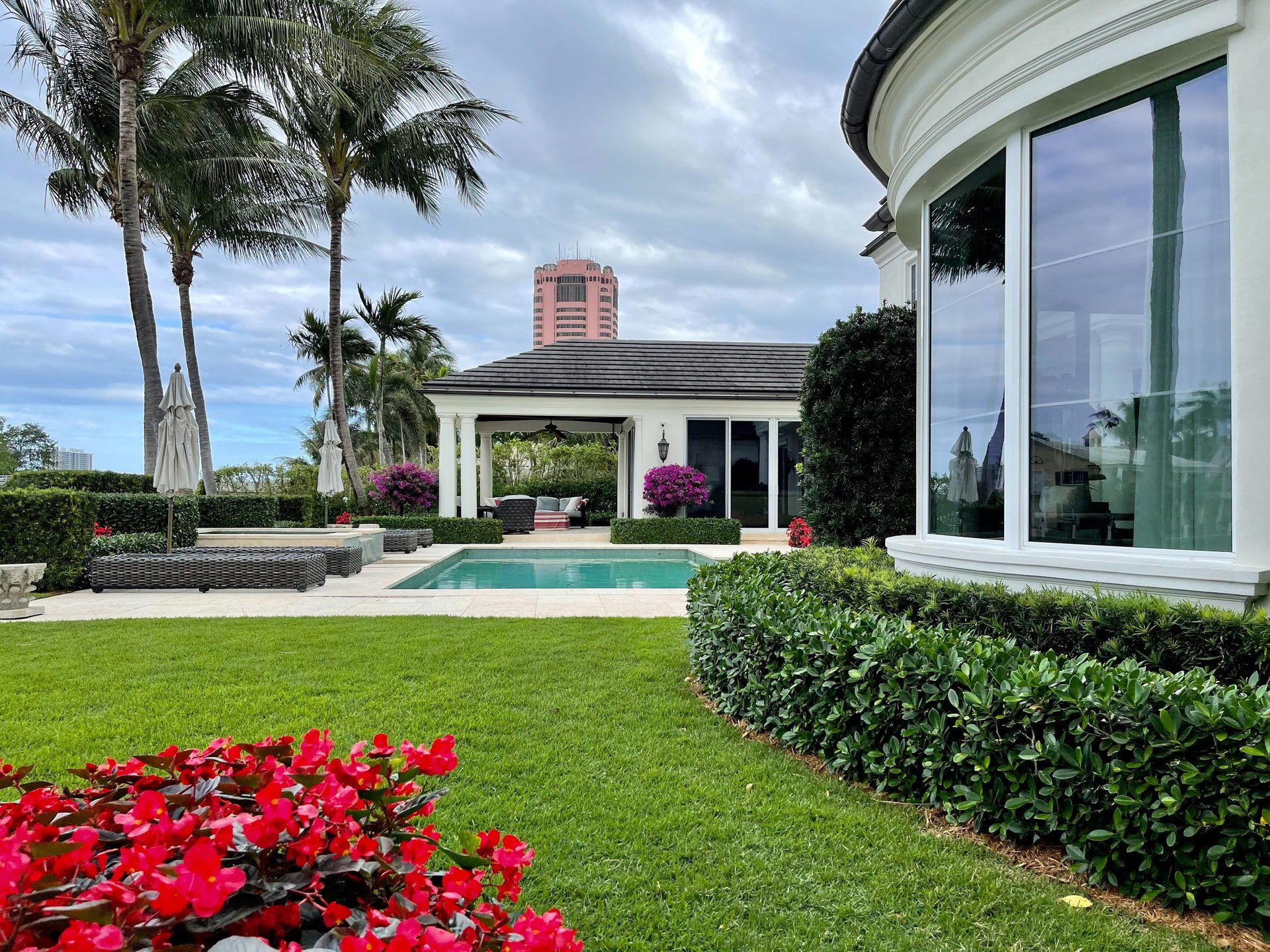 South Florida backyard pool and professionally maintained lawn by Florida Boys