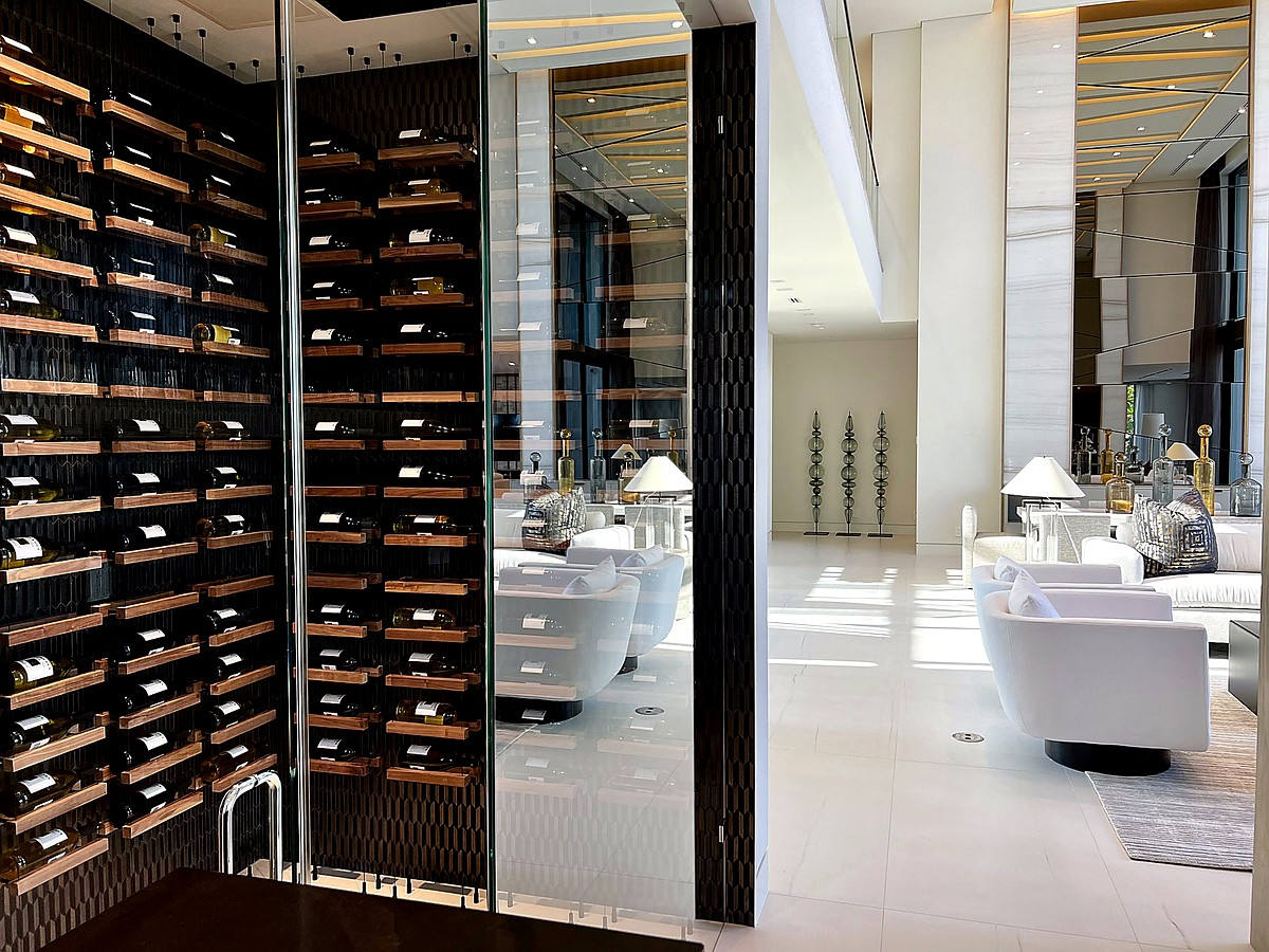 Luxury wine cellar with pristine glass walls in Boca Raton estate